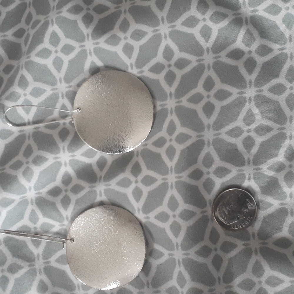 Silver disk dangling earrings by Apt 9